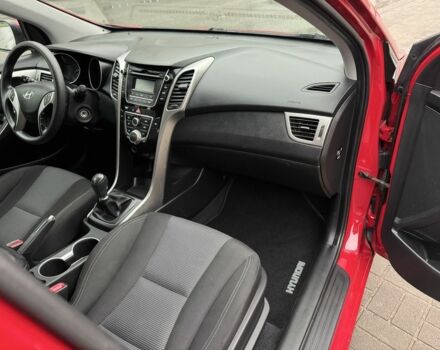 Червоний Хендай i30, об'ємом двигуна 1.4 л та пробігом 72 тис. км за 7800 $, фото 15 на Automoto.ua
