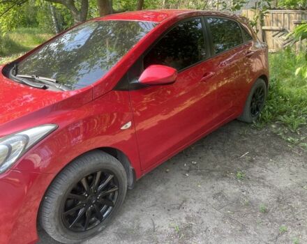 Красный Хендай i30, объемом двигателя 1.4 л и пробегом 145 тыс. км за 8000 $, фото 1 на Automoto.ua