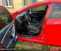 Червоний Хендай i30, об'ємом двигуна 1.4 л та пробігом 148 тис. км за 7400 $, фото 4 на Automoto.ua
