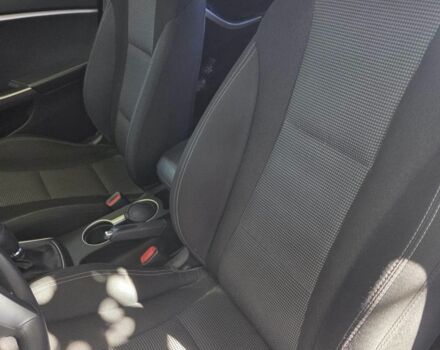 Червоний Хендай i30, об'ємом двигуна 1.4 л та пробігом 33 тис. км за 13208 $, фото 2 на Automoto.ua