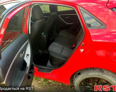Червоний Хендай i30, об'ємом двигуна 1.4 л та пробігом 148 тис. км за 7400 $, фото 5 на Automoto.ua