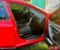 Червоний Хендай i30, об'ємом двигуна 1.4 л та пробігом 148 тис. км за 7400 $, фото 1 на Automoto.ua