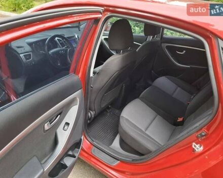 Красный Хендай i30, объемом двигателя 1.58 л и пробегом 208 тыс. км за 7700 $, фото 9 на Automoto.ua