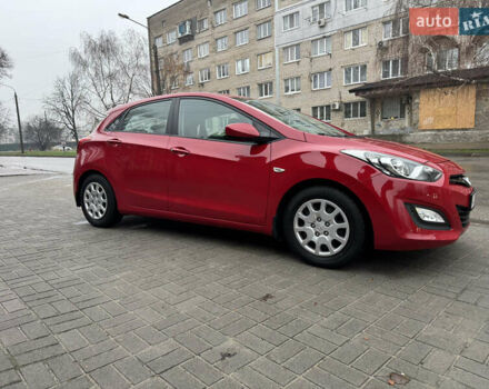 Червоний Хендай i30, об'ємом двигуна 1.4 л та пробігом 72 тис. км за 7800 $, фото 4 на Automoto.ua