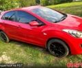 Красный Хендай i30, объемом двигателя 1.4 л и пробегом 148 тыс. км за 7400 $, фото 1 на Automoto.ua