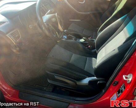 Червоний Хендай i30, об'ємом двигуна 1.4 л та пробігом 148 тис. км за 7400 $, фото 6 на Automoto.ua