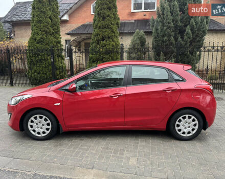 Червоний Хендай i30, об'ємом двигуна 1.4 л та пробігом 72 тис. км за 7800 $, фото 11 на Automoto.ua