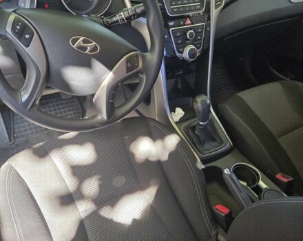 Червоний Хендай i30, об'ємом двигуна 1.4 л та пробігом 33 тис. км за 13208 $, фото 5 на Automoto.ua