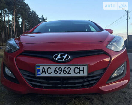 Червоний Хендай i30, об'ємом двигуна 1.4 л та пробігом 200 тис. км за 8300 $, фото 2 на Automoto.ua