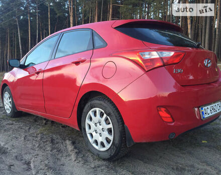 Червоний Хендай i30, об'ємом двигуна 1.4 л та пробігом 200 тис. км за 8300 $, фото 5 на Automoto.ua