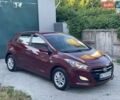 Красный Хендай i30, объемом двигателя 1.59 л и пробегом 84 тыс. км за 13850 $, фото 1 на Automoto.ua
