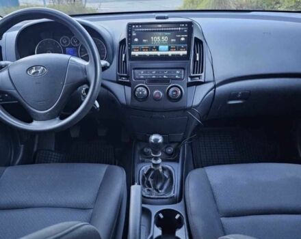 Красный Хендай i30, объемом двигателя 1.4 л и пробегом 197 тыс. км за 4041 $, фото 7 на Automoto.ua