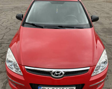 Красный Хендай i30, объемом двигателя 1.6 л и пробегом 186 тыс. км за 6100 $, фото 1 на Automoto.ua