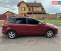 Красный Хендай i30, объемом двигателя 1.58 л и пробегом 200 тыс. км за 4100 $, фото 1 на Automoto.ua