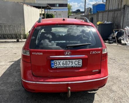 Красный Хендай i30, объемом двигателя 1.6 л и пробегом 325 тыс. км за 4700 $, фото 4 на Automoto.ua