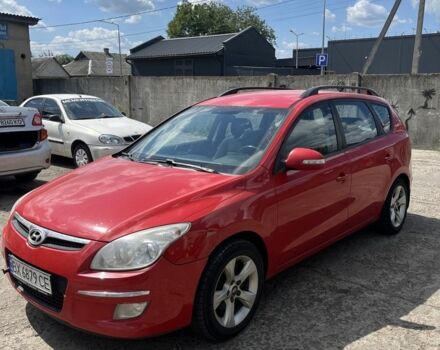 Красный Хендай i30, объемом двигателя 1.6 л и пробегом 325 тыс. км за 4700 $, фото 1 на Automoto.ua