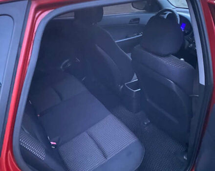 Червоний Хендай i30, об'ємом двигуна 1.58 л та пробігом 223 тис. км за 5200 $, фото 5 на Automoto.ua