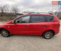 Червоний Хендай i30, об'ємом двигуна 1.4 л та пробігом 245 тис. км за 5700 $, фото 1 на Automoto.ua