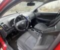 Красный Хендай i30, объемом двигателя 1.4 л и пробегом 245 тыс. км за 5700 $, фото 4 на Automoto.ua