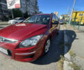 Красный Хендай i30, объемом двигателя 1.4 л и пробегом 160 тыс. км за 6000 $, фото 1 на Automoto.ua