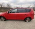 Красный Хендай i30, объемом двигателя 1.4 л и пробегом 245 тыс. км за 5700 $, фото 1 на Automoto.ua