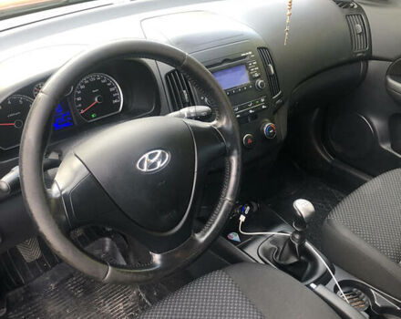 Красный Хендай i30, объемом двигателя 1.4 л и пробегом 222 тыс. км за 6200 $, фото 10 на Automoto.ua