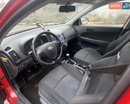 Червоний Хендай i30, об'ємом двигуна 1.4 л та пробігом 245 тис. км за 5700 $, фото 6 на Automoto.ua