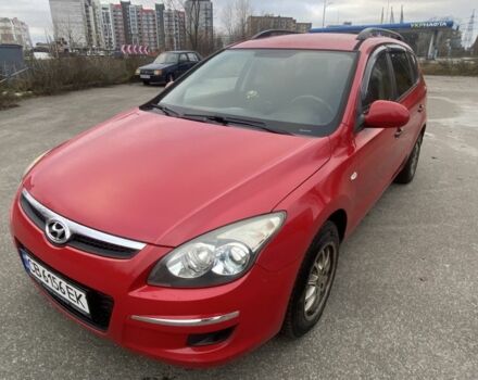 Красный Хендай i30, объемом двигателя 1.4 л и пробегом 245 тыс. км за 5700 $, фото 1 на Automoto.ua