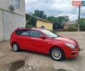 Красный Хендай i30, объемом двигателя 1.4 л и пробегом 200 тыс. км за 5300 $, фото 1 на Automoto.ua