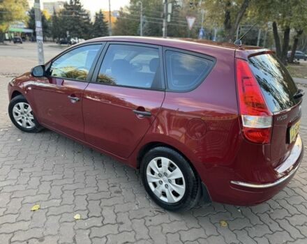 Красный Хендай i30, объемом двигателя 1.4 л и пробегом 234 тыс. км за 5850 $, фото 4 на Automoto.ua