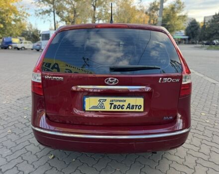 Красный Хендай i30, объемом двигателя 1.4 л и пробегом 234 тыс. км за 5850 $, фото 5 на Automoto.ua