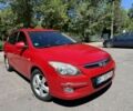 Красный Хендай i30, объемом двигателя 1.4 л и пробегом 300 тыс. км за 5900 $, фото 1 на Automoto.ua