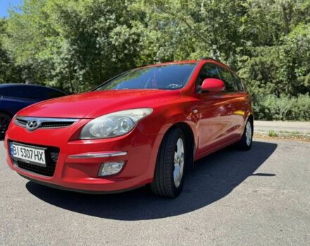 Красный Хендай i30, объемом двигателя 1.4 л и пробегом 300 тыс. км за 5900 $, фото 2 на Automoto.ua