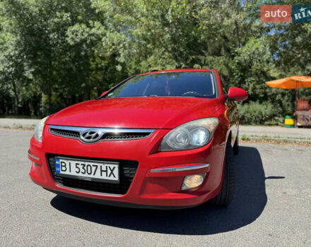 Красный Хендай i30, объемом двигателя 1.4 л и пробегом 302 тыс. км за 6000 $, фото 2 на Automoto.ua