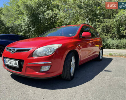 Красный Хендай i30, объемом двигателя 1.4 л и пробегом 302 тыс. км за 6000 $, фото 6 на Automoto.ua