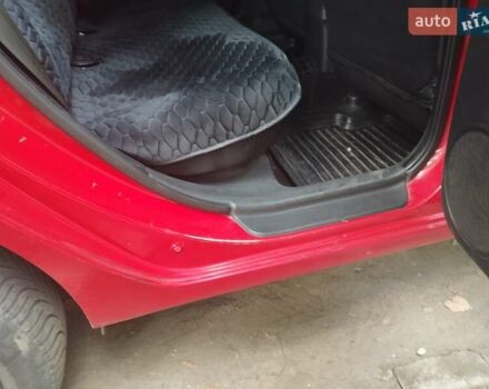 Червоний Хендай i30, об'ємом двигуна 1.4 л та пробігом 280 тис. км за 4750 $, фото 7 на Automoto.ua
