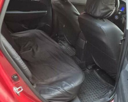 Красный Хендай i30, объемом двигателя 1.4 л и пробегом 189 тыс. км за 6500 $, фото 5 на Automoto.ua