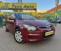 Красный Хендай i30, объемом двигателя 1.4 л и пробегом 234 тыс. км за 5850 $, фото 1 на Automoto.ua