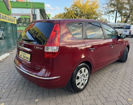 Красный Хендай i30, объемом двигателя 1.4 л и пробегом 234 тыс. км за 5850 $, фото 6 на Automoto.ua
