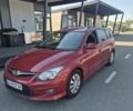 Красный Хендай i30, объемом двигателя 1.4 л и пробегом 237 тыс. км за 4350 $, фото 1 на Automoto.ua