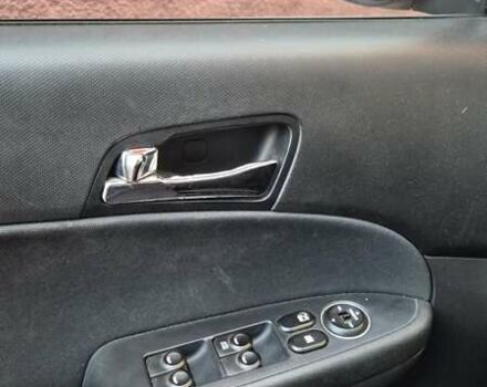 Красный Хендай i30, объемом двигателя 1.4 л и пробегом 189 тыс. км за 6500 $, фото 10 на Automoto.ua