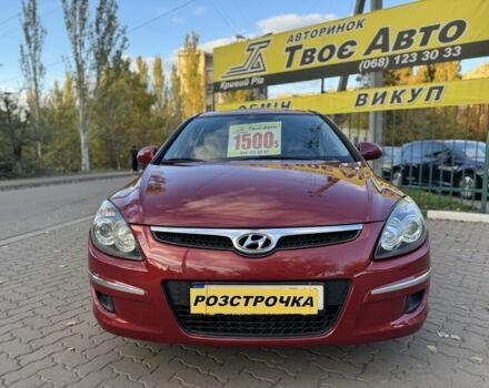 Красный Хендай i30, объемом двигателя 1.4 л и пробегом 234 тыс. км за 5850 $, фото 1 на Automoto.ua