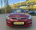 Красный Хендай i30, объемом двигателя 1.4 л и пробегом 234 тыс. км за 5850 $, фото 1 на Automoto.ua