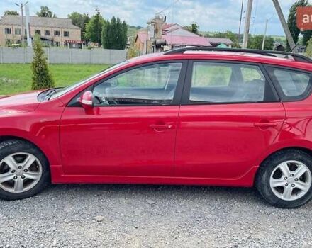Красный Хендай i30, объемом двигателя 1.4 л и пробегом 230 тыс. км за 5999 $, фото 1 на Automoto.ua