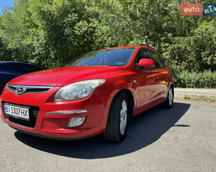 Красный Хендай i30, объемом двигателя 1.4 л и пробегом 302 тыс. км за 6000 $, фото 7 на Automoto.ua