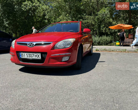 Красный Хендай i30, объемом двигателя 1.4 л и пробегом 302 тыс. км за 6000 $, фото 8 на Automoto.ua