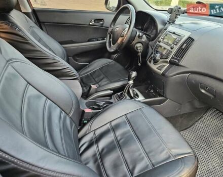 Червоний Хендай i30, об'ємом двигуна 1.58 л та пробігом 299 тис. км за 6200 $, фото 7 на Automoto.ua