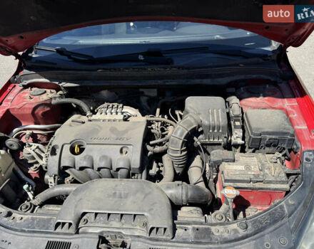 Красный Хендай i30, объемом двигателя 1.4 л и пробегом 302 тыс. км за 6000 $, фото 21 на Automoto.ua