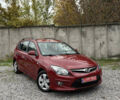 Красный Хендай i30, объемом двигателя 1.4 л и пробегом 181 тыс. км за 6500 $, фото 1 на Automoto.ua