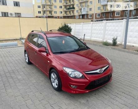 Червоний Хендай i30, об'ємом двигуна 1.59 л та пробігом 240 тис. км за 8300 $, фото 1 на Automoto.ua